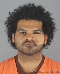 Mugshot of JOHNNY JR LUGO booked in Hennepin County, Minnesota on May 13, 2026