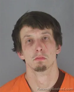 Mugshot of LEIGHTON HUNTER SLAGEL booked in Hennepin County, Minnesota on May 14, 2026