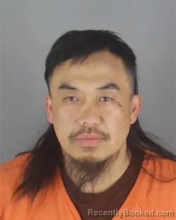 Mugshot of KOU LEE booked in Hennepin County, Minnesota on May 14, 2026