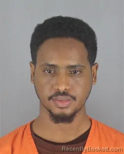 Mugshot of IBRAHIM HIRSI booked in Hennepin County, Minnesota on May 14, 2026