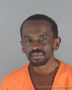 Mugshot of ABDULAHI AHMED OMAR booked in Hennepin County, Minnesota on May 14, 2026