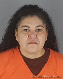 Mugshot of ROSA MARIA VELEZ booked in Hennepin County, Minnesota on May 15, 2026