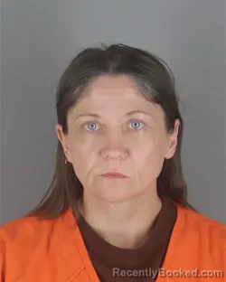 Mugshot of DIANA MARIE HUGHES booked in Hennepin County, Minnesota on May 15, 2026
