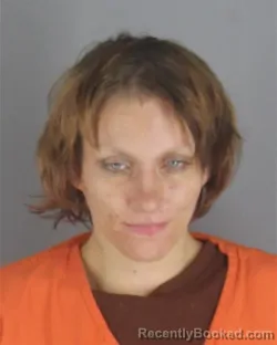 Mugshot of ASHLEY MARIE OLSON booked in Hennepin County, Minnesota on May 15, 2026