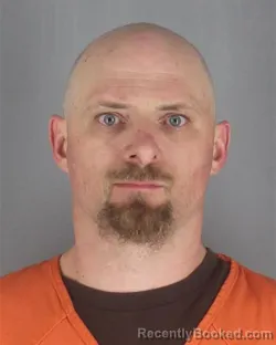 Mugshot of MARK DANIEL CONOVER booked in Hennepin County, Minnesota on May 16, 2026