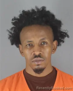 Mugshot of MOHAMED HUSEIN HASSAN booked in Hennepin County, Minnesota on June 5, 2026