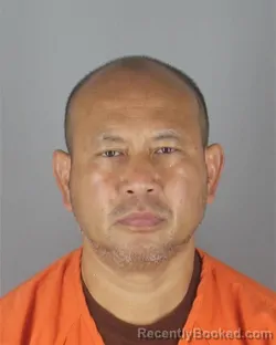 Mugshot of KHAMPHYTHOUN TOM PHALAVONG booked in Hennepin County, Minnesota on June 6, 2026