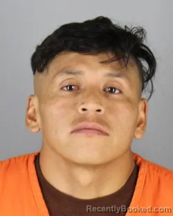 Mugshot of CARLOS ALBERTO COLLAGUAZO LAGUATASIG booked in Hennepin County, Minnesota on June 15, 2026
