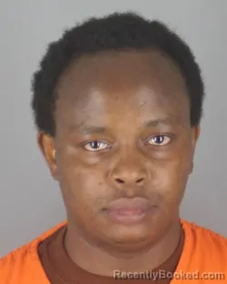 Mugshot of ELIJAH MWEBI ONDERI booked in Hennepin County, Minnesota on June 21, 2026