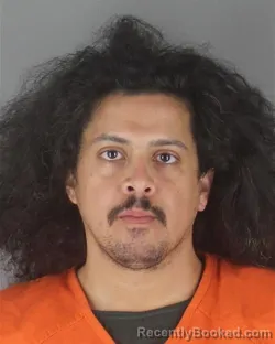 Mugshot of ANTOINE AYMAN GHALY booked in Hennepin County, Minnesota on June 23, 2026
