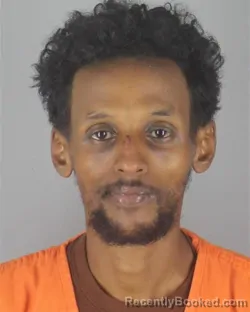 Mugshot of ABUBAKAR ADEN MUR booked in Hennepin County, Minnesota on June 23, 2026