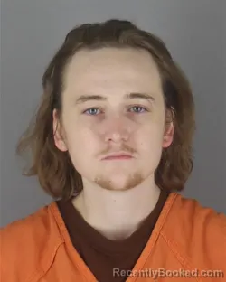 Mugshot of ALEX WAYNE OLSON booked in Hennepin County, Minnesota on June 23, 2026