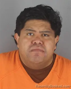 Mugshot of ALEX DARIO GUAMISI GUERRERO booked in Hennepin County, Minnesota on June 23, 2026
