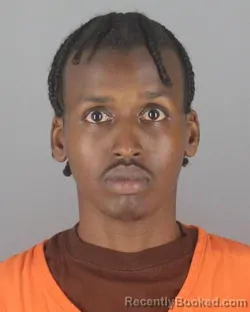 Mugshot of MOHAMED RASHID ABDIKUDUS booked in Hennepin County, Minnesota on June 25, 2026