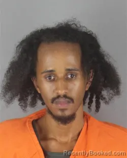 Mugshot of SADAM ABDI MOGE booked in Hennepin County, Minnesota on June 26, 2026