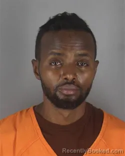 Mugshot of ABDIFATAH MOHAMED HASSAN booked in Hennepin County, Minnesota on June 27, 2026