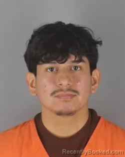 Mugshot of ERIK ABRAN HUERTA LOJA booked in Hennepin County, Minnesota on June 27, 2026