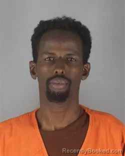 Mugshot of HUSSEIN ABDI HIRE booked in Hennepin County, Minnesota on June 27, 2026