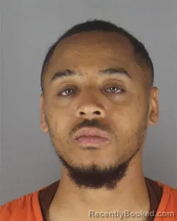 Mugshot of XAVIER ALEXANDER FRAZIER booked in Hennepin County, Minnesota on June 27, 2026