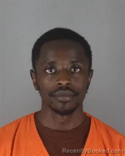 Mugshot of KELVIN MOKONO OMWERI booked in Hennepin County, Minnesota on June 28, 2026