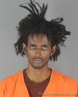 Mugshot of MUHUMED SULEIMAN ABDI booked in Hennepin County, Minnesota on June 30, 2026