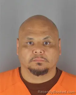 Mugshot of DORIAN JOHN OLSON booked in Hennepin County, Minnesota on June 30, 2026