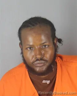 Mugshot of MUSTAFA ABDIRAHMAN ABDI booked in Hennepin County, Minnesota on July 1, 2026
