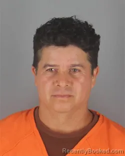 Mugshot of OMAR FRANKLIN UBE SALGUERO booked in Hennepin County, Minnesota on July 1, 2026
