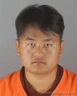Mugshot of CHUE YANG booked in Hennepin County, Minnesota on July 1, 2026