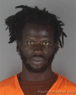 Mugshot of PAUL OKELLO OCHAN booked in Hennepin County, Minnesota on July 2, 2026