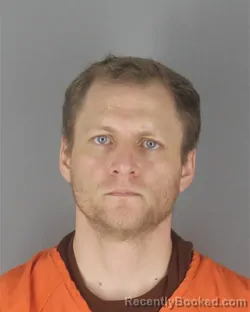 Mugshot of RICHARD STERLING SQUIRES booked in Hennepin County, Minnesota on July 2, 2026