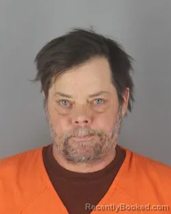Mugshot of RYAN ALAN RENNER booked in Hennepin County, Minnesota on July 2, 2026