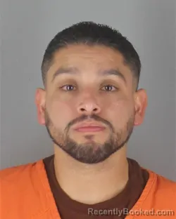 Mugshot of MICHAEL ANTHONY MADRIGAL booked in Hennepin County, Minnesota on July 5, 2026