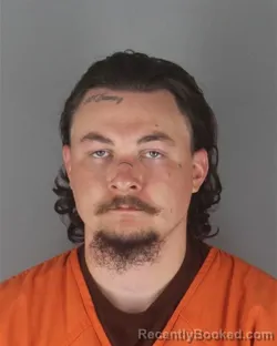 Mugshot of TANNER JOHN SPIES booked in Hennepin County, Minnesota on July 5, 2026