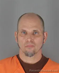 Mugshot of ERIK CHAD JENSEN booked in Hennepin County, Minnesota on July 7, 2026