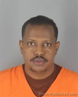 Mugshot of IBRAHIM HASSAN ROBLE booked in Hennepin County, Minnesota on July 8, 2026