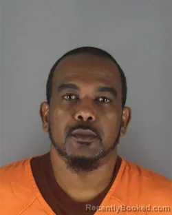Mugshot of MAHAD FARAH booked in Hennepin County, Minnesota on July 8, 2026