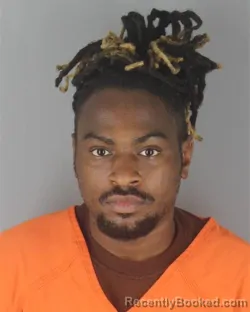 Mugshot of JUSTIN JAMAL WILLIAMS booked in Hennepin County, Minnesota on July 8, 2026