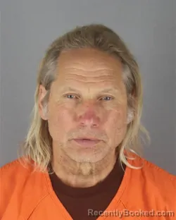 Mugshot of SCOTT BRADLEY OLSON booked in Hennepin County, Minnesota on July 8, 2026