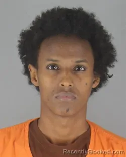 Mugshot of ZEKARIYA ABDIKADIR ELMI booked in Hennepin County, Minnesota on July 8, 2026
