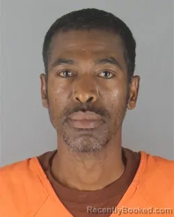 Mugshot of ABRAHAM HAJI MOHAMED booked in Hennepin County, Minnesota on July 8, 2026