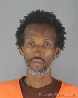 Mugshot of MOHAMED ABDI SHIDE booked in Hennepin County, Minnesota on July 8, 2026