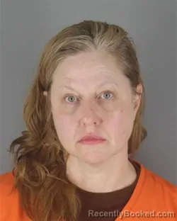Mugshot of TRACY TOMANEK KOSKI booked in Hennepin County, Minnesota on July 9, 2026