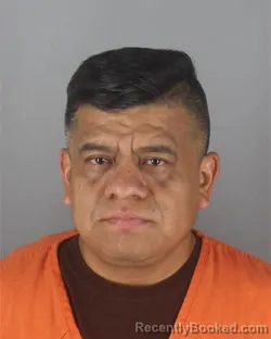 Mugshot of JUAN MARTINEZ LOPEZ booked in Hennepin County, Minnesota on July 9, 2026
