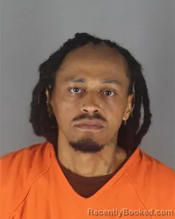 Mugshot of CHEBO NJOYA CHOMILO booked in Hennepin County, Minnesota on July 9, 2026