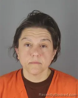 Mugshot of JAYMI ANN WARREN booked in Hennepin County, Minnesota on July 9, 2026