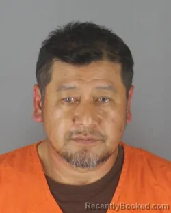 Mugshot of NOUDONE DAOHEUANG booked in Hennepin County, Minnesota on July 9, 2026
