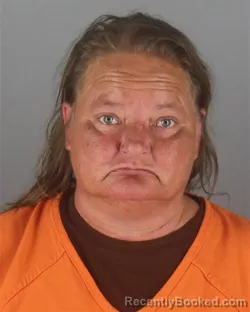 Mugshot of JODI MARIE HENRY booked in Hennepin County, Minnesota on July 10, 2026