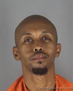 Mugshot of MOHAMED HASSAN ABDULLAHI booked in Hennepin County, Minnesota on July 11, 2026
