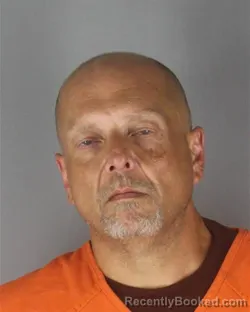Mugshot of ERIC DEAN ANDERSON booked in Hennepin County, Minnesota on July 11, 2026